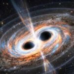 Two giant black holes are set to collide in the next 100 years, and Earth could feel the shockwaves |