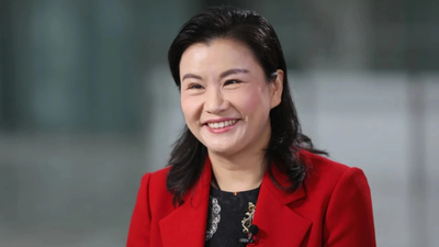 Once she worked in a glass factory, now she runs a $26 billion company and sits alongside Elon Musk and Tim Cook at China’s state dinner