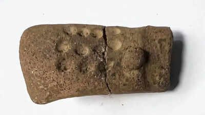 11 mysterious dots on a 2,700-year-old figurine are forcing archaeologists to rethink early writing in Guatemala | World News