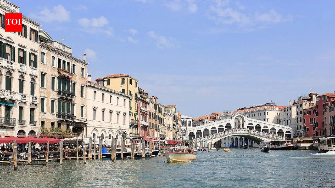 Which famous city is made up of 118 small islands in Italy and attracts millions of visitors each year |