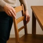 The hidden psychology behind people who always push their chair back after leaving a table: Experts say this tiny habit may reflect conscientiousness, respect and consideration for others