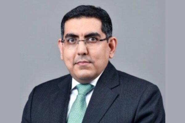 Who is Puneet Sharma, the Axis Bank CFO who has resigned?