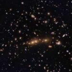 NASA's Hubble spots two enormous galaxy clusters merging billions of light-years away |