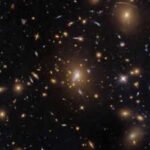 NASA’s Hubble sees a swarm of galaxies in one of the universe’s largest structures |