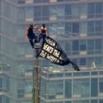 Empire State Building climb: Couple arrested after proposal atop New York's skyscraper - video