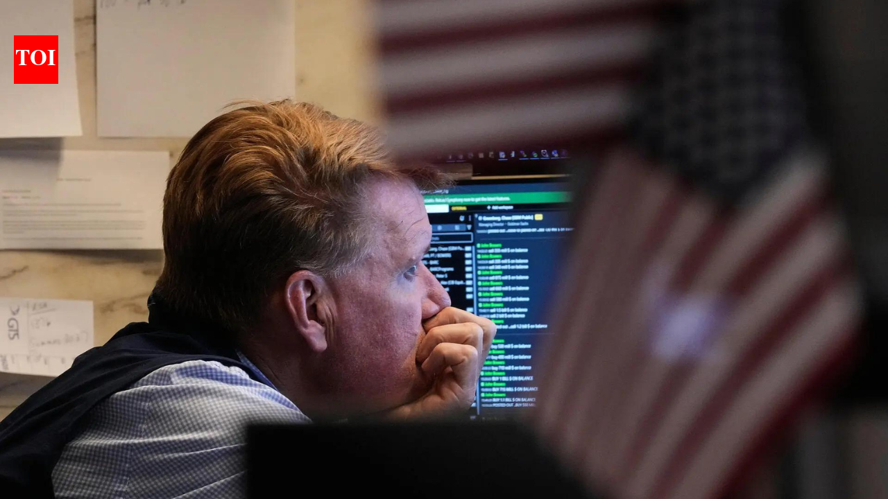 US stock market today: Wall Street sees mixed performance; Dow rises 0.3%, Nasdaq falls 0.8% as AI stocks slide