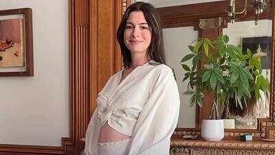 Anne Hathaway says she was 'shocked' to learn she was pregnant with baby No. 3: 'We're calling this one our buzzer-beater' |
