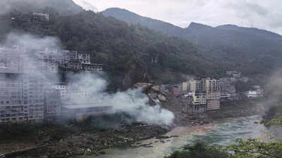 China Landslide: Several trapped after landslide buries homes in China's Chongqing