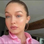 Gigi Hadid stuns in sparkling all-pink vintage gown for bridesmaid duties at Taylor Swift and Travis Kelce's Madison Square Garden wedding |