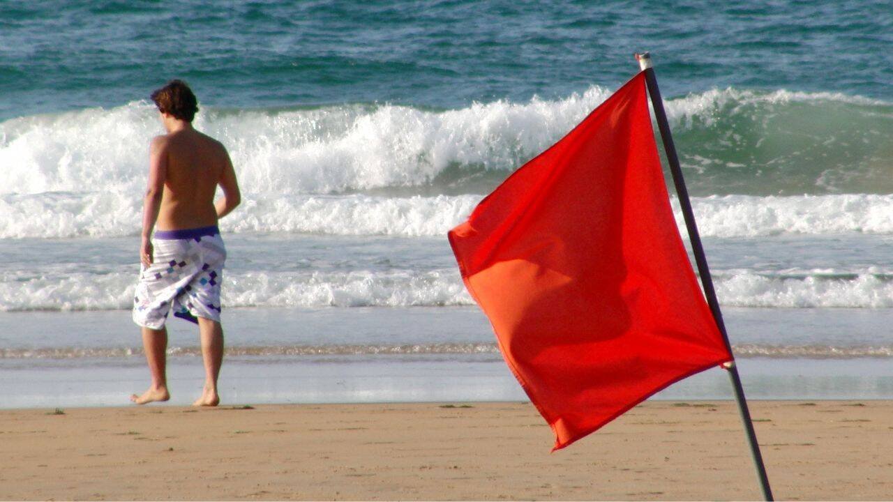Beach Flag Rules: What do red, yellow, purple, green, and double flags mean at the beach? Why every traveller should be aware of these beach rules |
