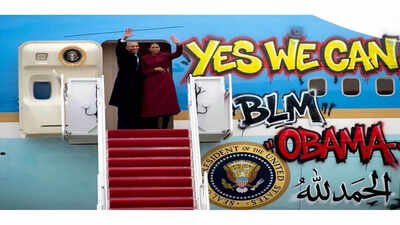 A doctored pic of﻿ Obamas & Air Force One with graffiti