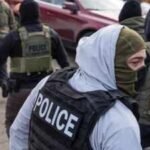 US judge blocks New York's ban on ICE officers wearing face masks