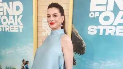Anne Hathaway hilariously addresses bizarre rumours of fake pregnancy: ‘Fake hair, real bump' |