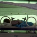 Indonesian woman gives birth under torchlight during magnitude 7.7 earthquake