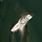 Built in 1913, this 177-foot steam tug survived two world wars but sank after hitting a German mine in 1945; drought has now exposed its wreck in Serbia