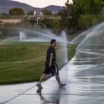 Las Vegas Valley converted 250 million sq ft of lawn to save water, saving 203 billion gallons; researchers found turf removal can raise summer land-surface temperatures about 20°C