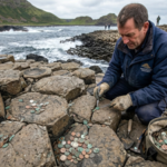 For years, visitors left coins for luck in Giant’s Causeway’s ancient rocks. Years later, more than 10,000 coins have been removed to protect the World Heritage Site