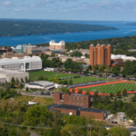 In 2000, Cornell began pulling 39°F water from 250 feet below Cayuga Lake to cool its campus; the system now cuts cooling energy use by about 85%