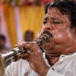 What is happening to this musician?