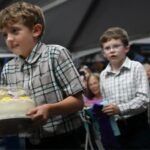 Maryland 10-year-old Herbie Martin IV stayed up until 2 a.m. perfecting his lemon blueberry buttercream cake; the grand champion cake sold for $15,000