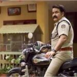 Mohanlal shares Onam poster of 'Athimanoharam'; actor appears as cop TS Lovelajan; reunites with Meera Jasmine | Malayalam Movie News