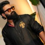 Rishab Shetty makes a cultural statement at IFFM 2026 Red Carpet in traditional black kurta and handwoven silk dhoti |