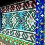 A Russian pensioner covered her Siberian home with 30,000 colourful bottle caps; the unusual recycling project turned a wooden house into a giant work of art