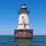 A painter paid $192,000 for a 1902 lighthouse three miles offshore; now he wants to turn the abandoned structure into a destination