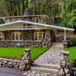 A developer planned to bulldoze this 1910 Oregon bungalow and divide its 1.04-acre lot; a preservationist bought it for $610,000 with only days to act, restored it and it has now sold for $1.47 million