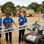 Five British schoolgirls aged 14 and 15 built a robot with five-metre folding arms designed to create wildfire firebreaks; their two-year-old robotics club is now representing Great Britain globally