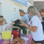 At age 6, Grace Hendrian opened a lemonade stand hoping to raise $10 for the Salvation Army; seven summers later, she and sister June closed the project after turning that tiny goal into about $55,000