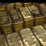 Gold hits 7-week low as oil surge fuels rate hike bets