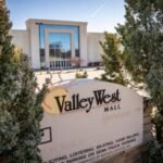 An Iowa developer bought the 58-acre Valley West Mall for $11 million; a nearly 50-year-old JCPenney lease now stands in the way of redevelopment as the city considers up to $110 million in incentives