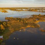 Finland's coast is still rising after the Ice Age; around the Gulf of Bothnia, 1,730 acres emerge each year, but waterfront owners may not own the new land