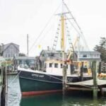 In 1929, a fisherman built a wooden boat beside the home where he was raising 13 children; nearly a century later, $1.5 million is being raised to restore it
