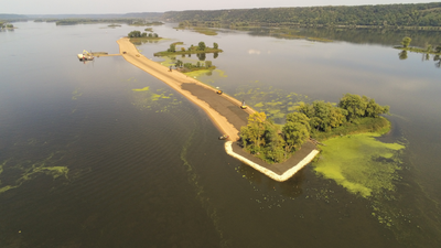 Mississippi River islands near Iowa have been disappearing; a $40 million project is now rebuilding the habitat with dredged material and is designed to protect or restore about 630 acres of river and backwater habitat