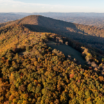 North Carolina acquired more than 342 acres without using local purchase money; the mountain property is now moving toward becoming Buncombe County's largest public park