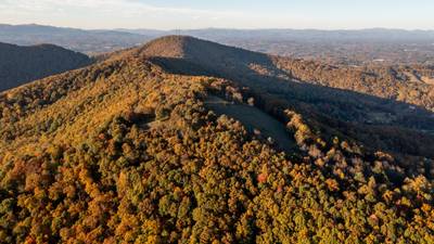 North Carolina acquired more than 342 acres without using local purchase money; the mountain property is now moving toward becoming Buncombe County's largest public park