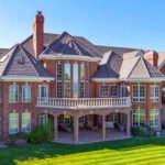 An Idaho riverfront mansion previously asking $3.86 million goes to auction without reserve on September 17; its owner has pledged the sale proceeds 50:50 to St. Jude and Mayo Clinic