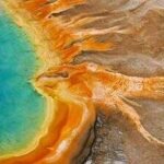 Yellowstone rangers remove 20,100 pieces of trash from geothermal areas in 2026, including more than 5,000 rocks and sticks, 280 visitor hats and over $18 in coins