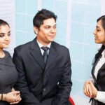 Psychology says that sweet-talking co-worker may be secretly jealous of you