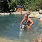 On their 65-acre Canadian property, Crystal Drinkwalter and Jazmyn Canning built a natural swimming pond for $52,000 after estimating professional construction could cost up to $200,000, moving 100,000 pounds of rock