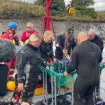 A diver searching the bottom of England’s River Wear has pulled up a huge three-legged iron cauldron that lay hidden underwater for hundreds of years, and researchers are still trying to work out how it got there