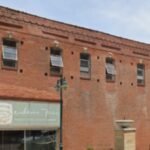 Kansas City building dating to 1874 faced emergency demolition after part of its roof collapsed; a developer stepped in, and the former fur shop is now being turned into a restaurant and apartments