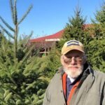 Illinois farmer John Dollinger's family hosted 10 wind turbines across 800 acres; payments began at $10,000 per turbine a year and, by 2025, had risen to about $120,000 annually across the farm
