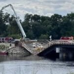 Maine was replacing an aging river bridge when part of the new structure collapsed during a concrete pour and injured workers; two months later, crews are dismantling the damaged spans before construction resumes