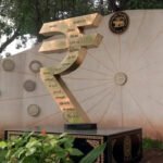 Rupee up 49 paise, RBI governor says curbs to halt speculation