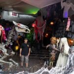 In 2017, a Michigan father turned free Halloween decorations into a backyard attraction that he says drew 18,000 visitors in 2024; nine years later, a neighbour's complaint sparked a dispute with the city