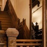 In 2024, a couple bought a neglected 1800s Brooklyn lodging house and uncovered a 1901 coal delivery schedule linked to the husband's family history; after a difficult restoration, it is becoming their third guesthouse