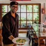 He ran away from home at 5 and spent years on Mumbai's streets; after building a business, Amin Sheikh opened a cafe where about 15 young people, many once homeless, now have jobs and housing support